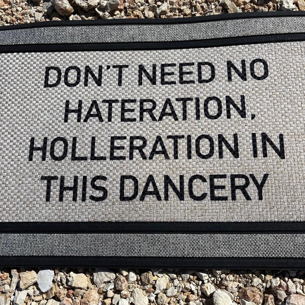 The Doormat District doormat with text 'No Hateration No Holleration In This Dancery' 