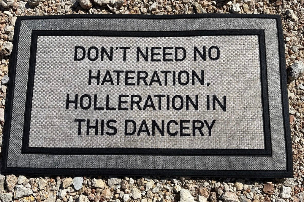 The Doormat District doormat with text 'No Hateration No Holleration In This Dancery'  
