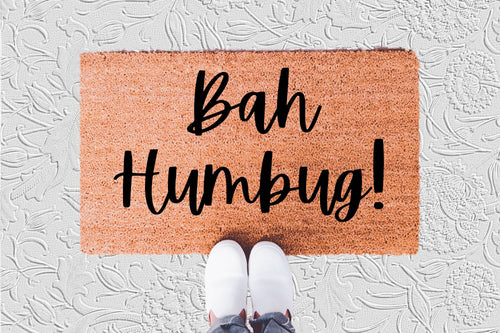 The Doormat District doormat with 'Bah Humbug!' text 