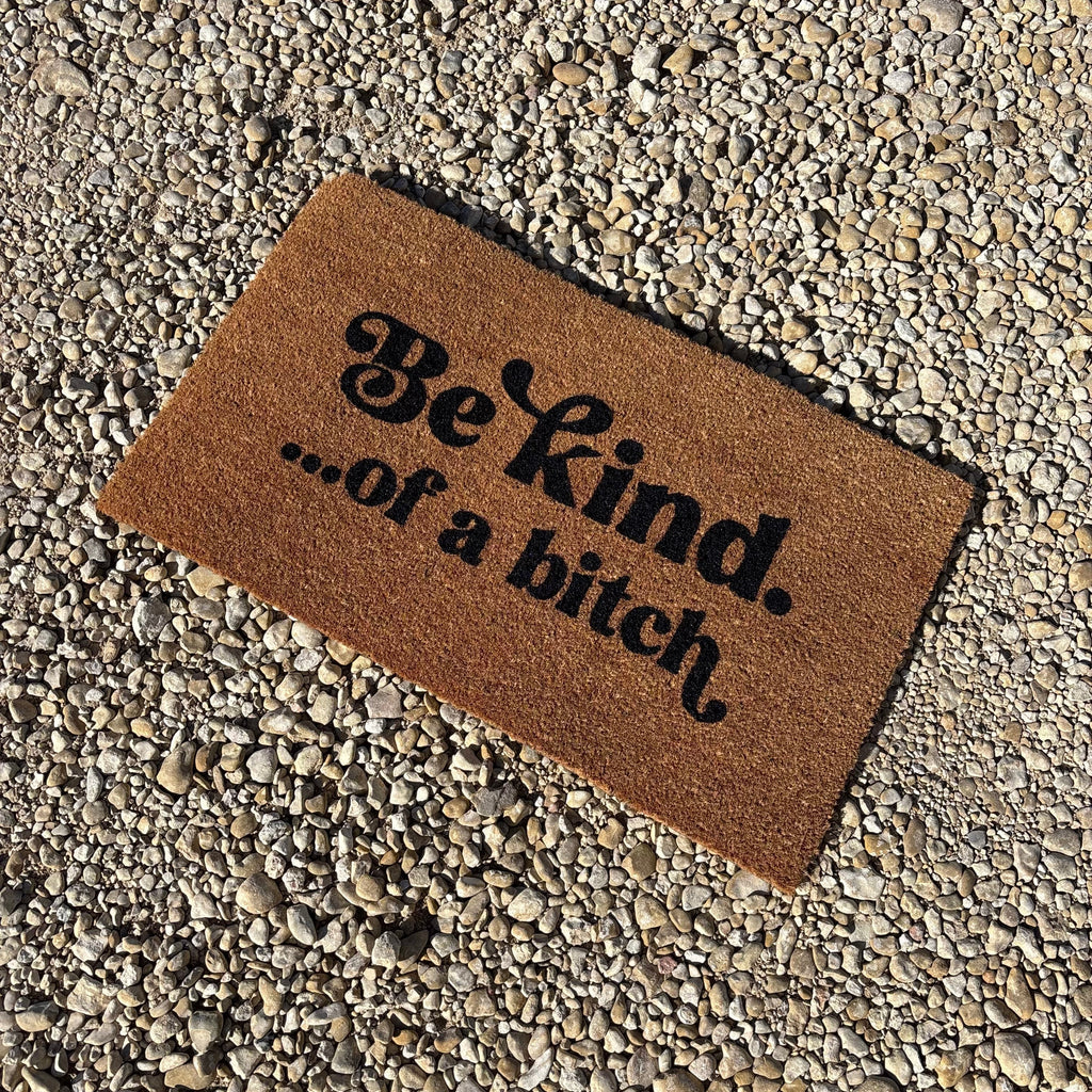 The Doormat District doormat with 'Be kind...of a b*ch' text 
