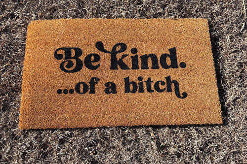The Doormat District doormat with 'Be kind...of a b*ch' text 