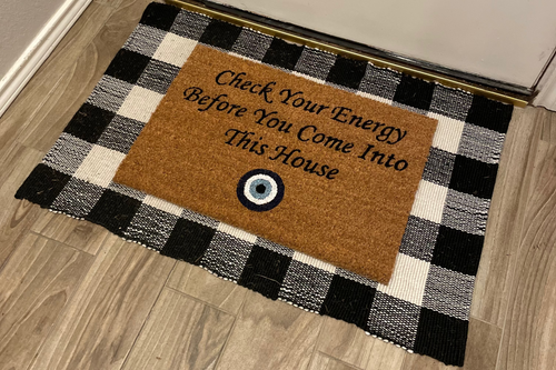 The Doormat District doormat with text "Check Your Energy Before You Come Into This House" with Blue Evil Eye