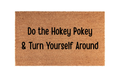 The Doormat District doormat with text 'Do the Hokey Pokey & Turn Yourself Around'