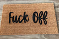 The Doormat District with 'Fck Off' text in cursive font
