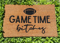 The Doormat District doormat text says " It's gametime bitches" with image of a football 