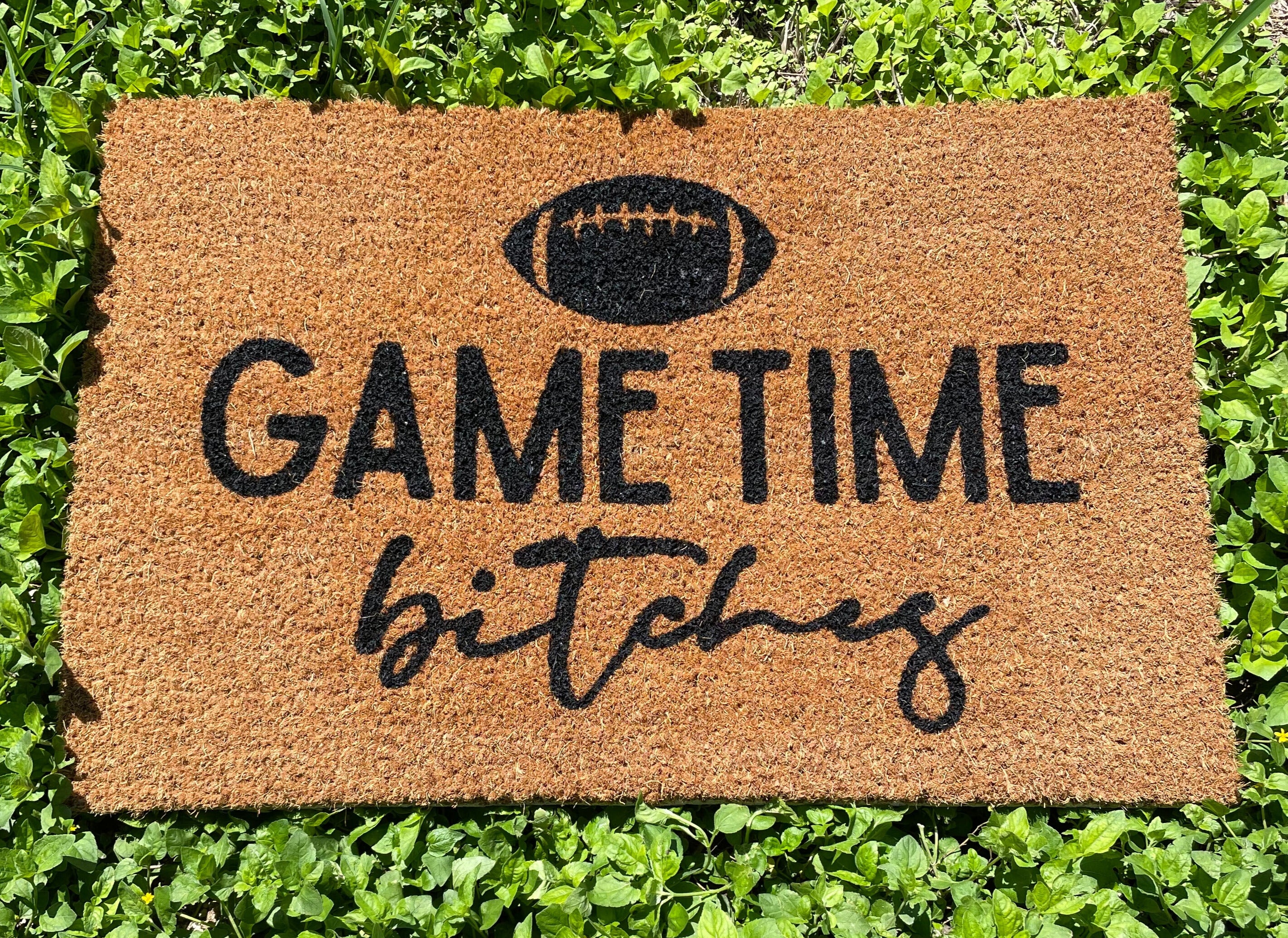 The Doormat District doormat text says " It's gametime bitches" with image of a football 