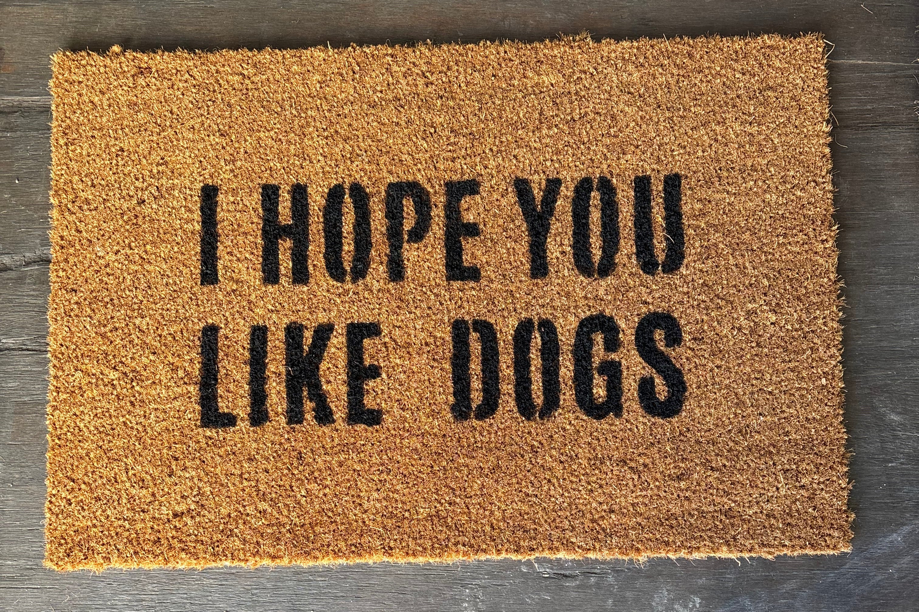 The Doormat District doormat with text 'I Hope You Like Dogs' 