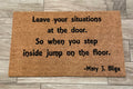 The Doormat District doormat with text "Leave Your Situations At The Door"