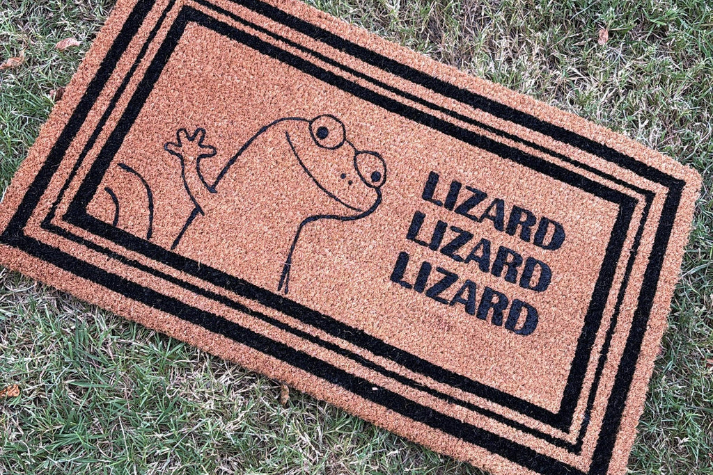 The Doormat District doormat with a lizard design and text that says 'Lizard Lizard Lizard' 