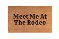 The Doormat District doormat with 'Meet Me At The Rodeo' text 