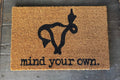 The Doormat District doormat with phrase "mind your own" with image of a Uterus