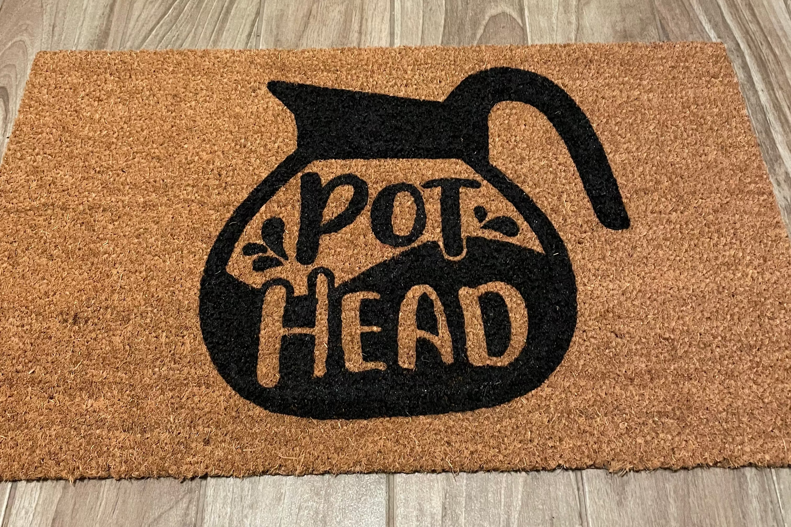 The Doormat District doormat with words "Pot Head" in Coffee Pot  