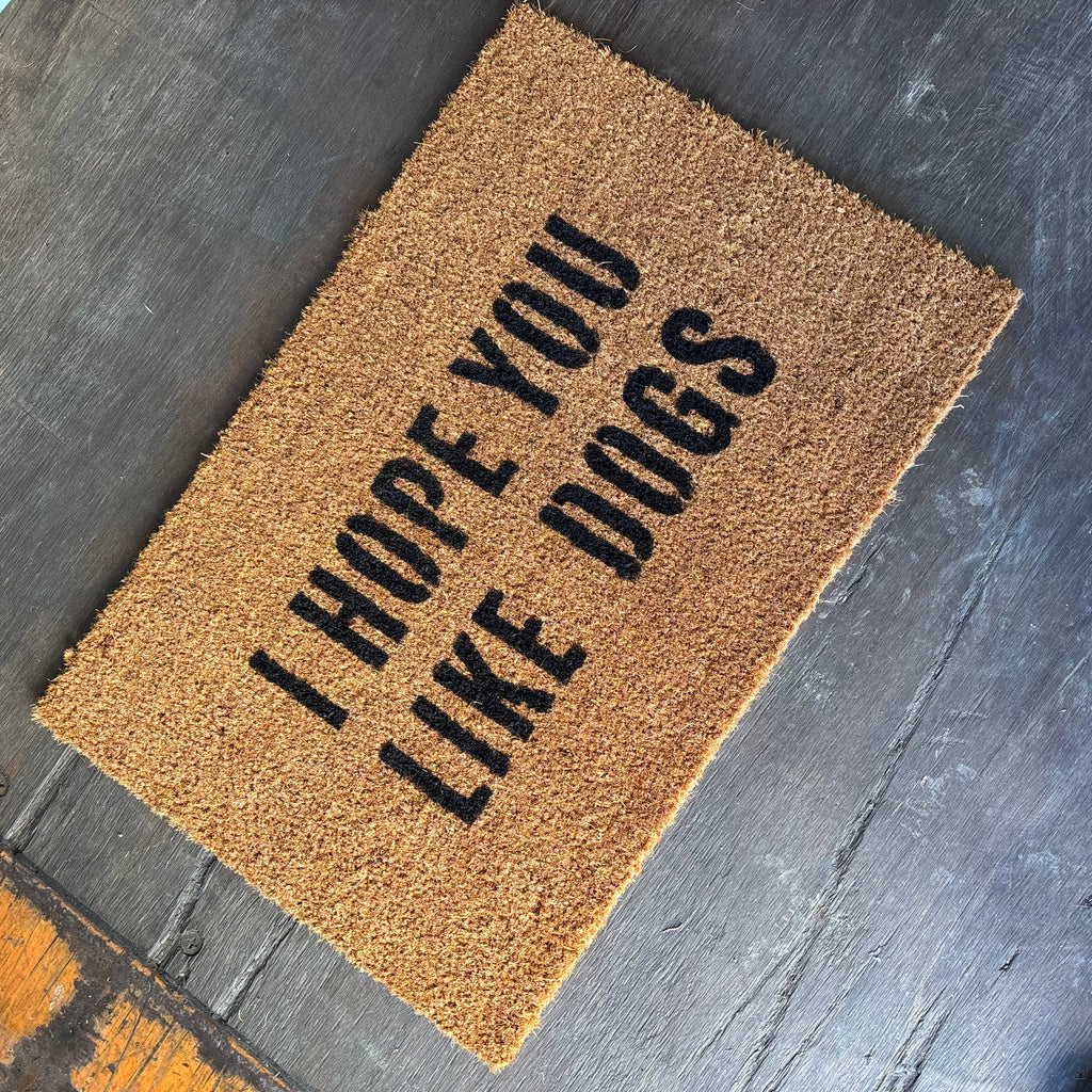 The Doormat District doormat with text 'I hope you like dogs' 