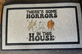 The Doormat District doormat There's Some Horrors In This House Adult Halloween 