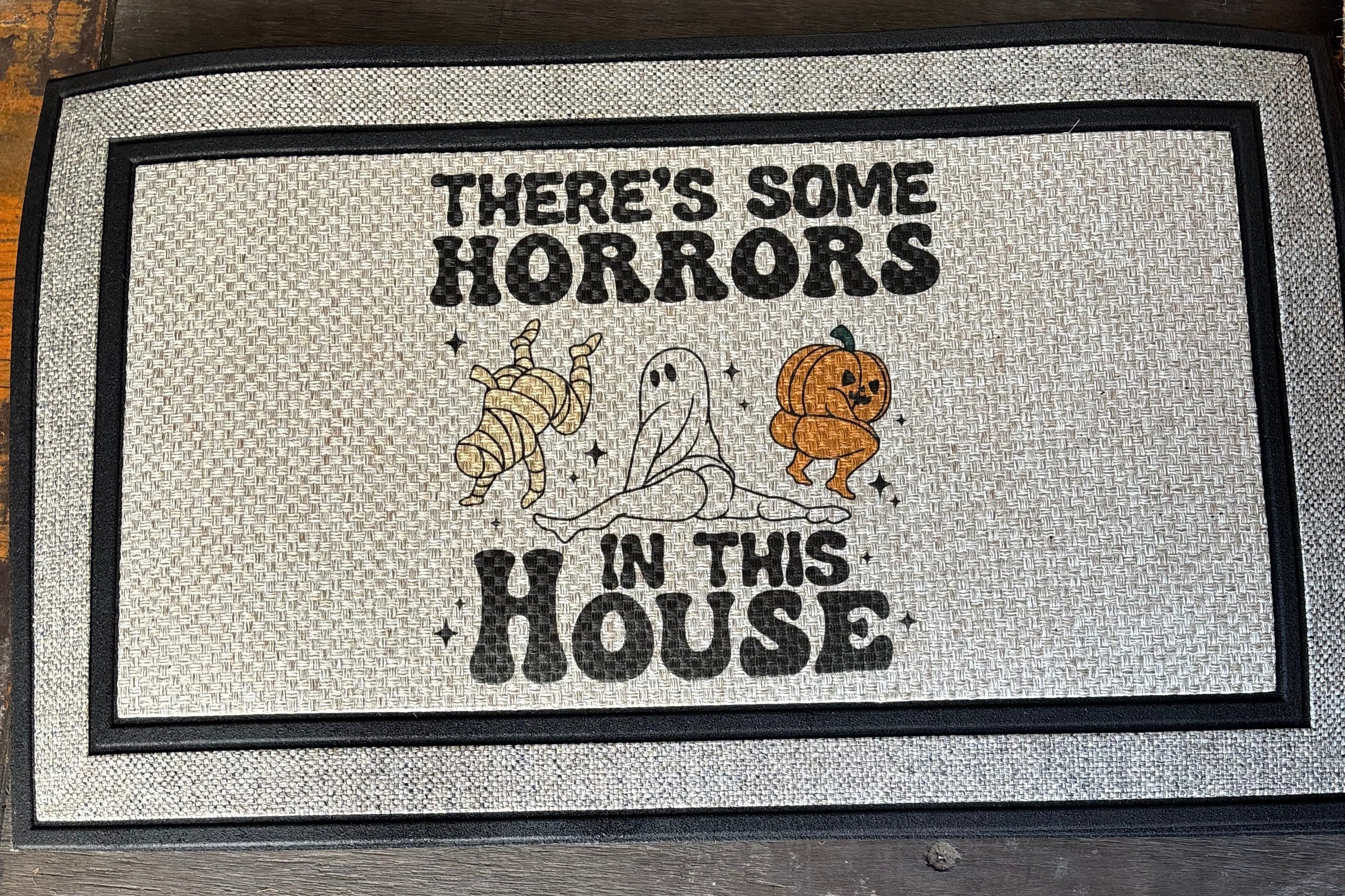 The Doormat District doormat There's Some Horrors In This House Adult Halloween 