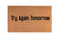 The Doormat District doormat with 'Try Again Tomorrow' text 