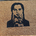 The Doormat District doormat with Wednesday Addams Image