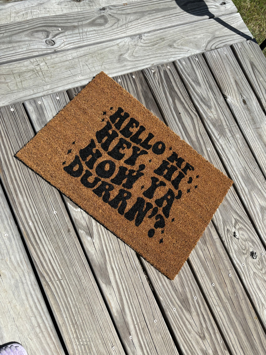 The Doormat District doormat with Hello Mf Hey Hi How Ya Durrn?
