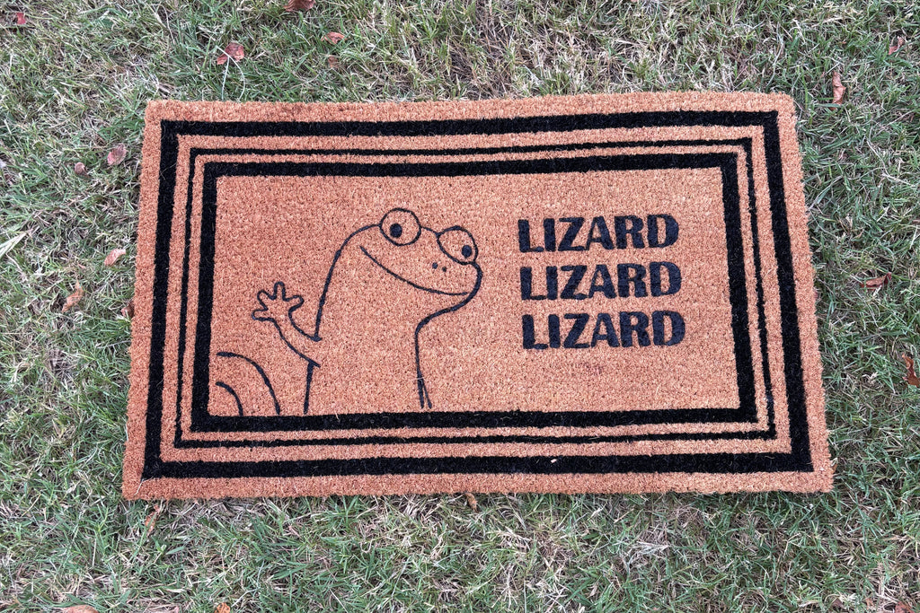The Doormat District doormat with Lizard image that says "Lizard Lizard Lizard" 
