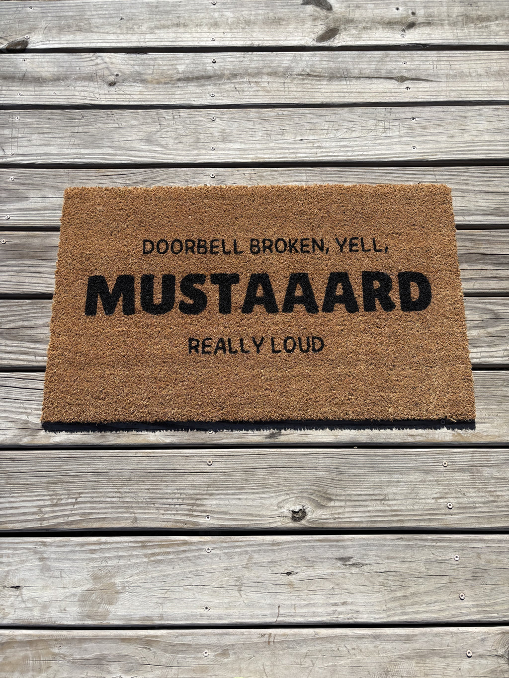 The Doormat District  Coir Doormat with the words "Doorbell broke, yell, MUSTAAARD really loud" 