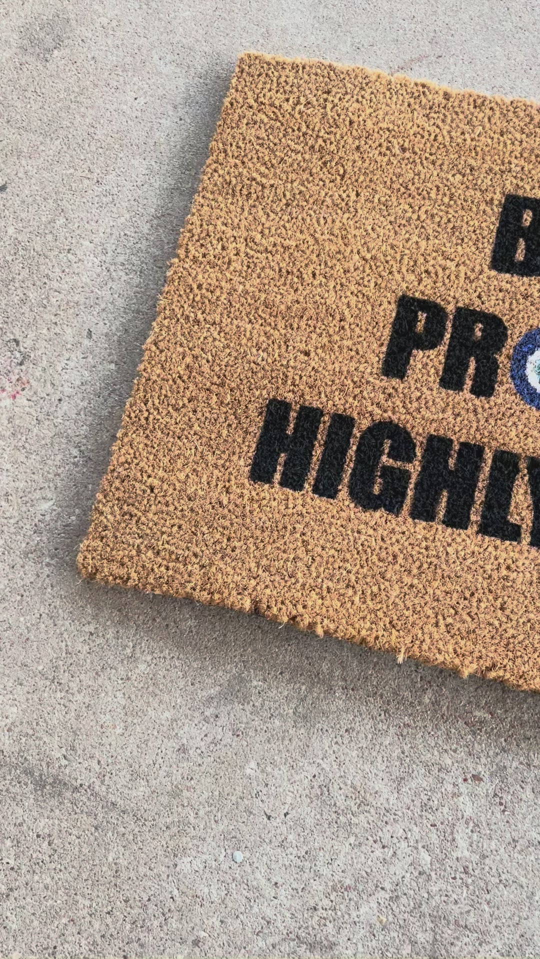The Doormat District doormat with text  "Blessed Protected Highly Favored" and Blue Evil Eyes