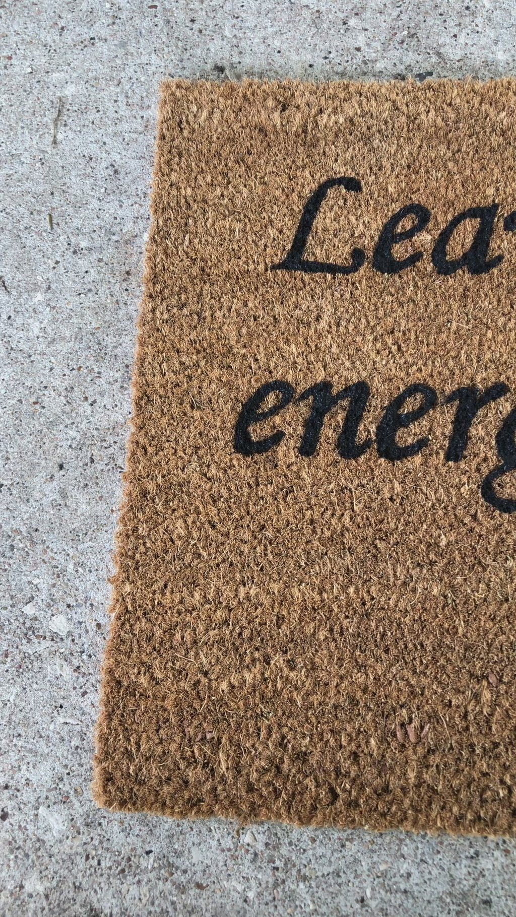 The Doormat District doormat with "Leave The Bad Energy Out Here" Blue Evil Eye